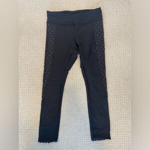 Lululemon run tights. Diamond graphic panels on sides.